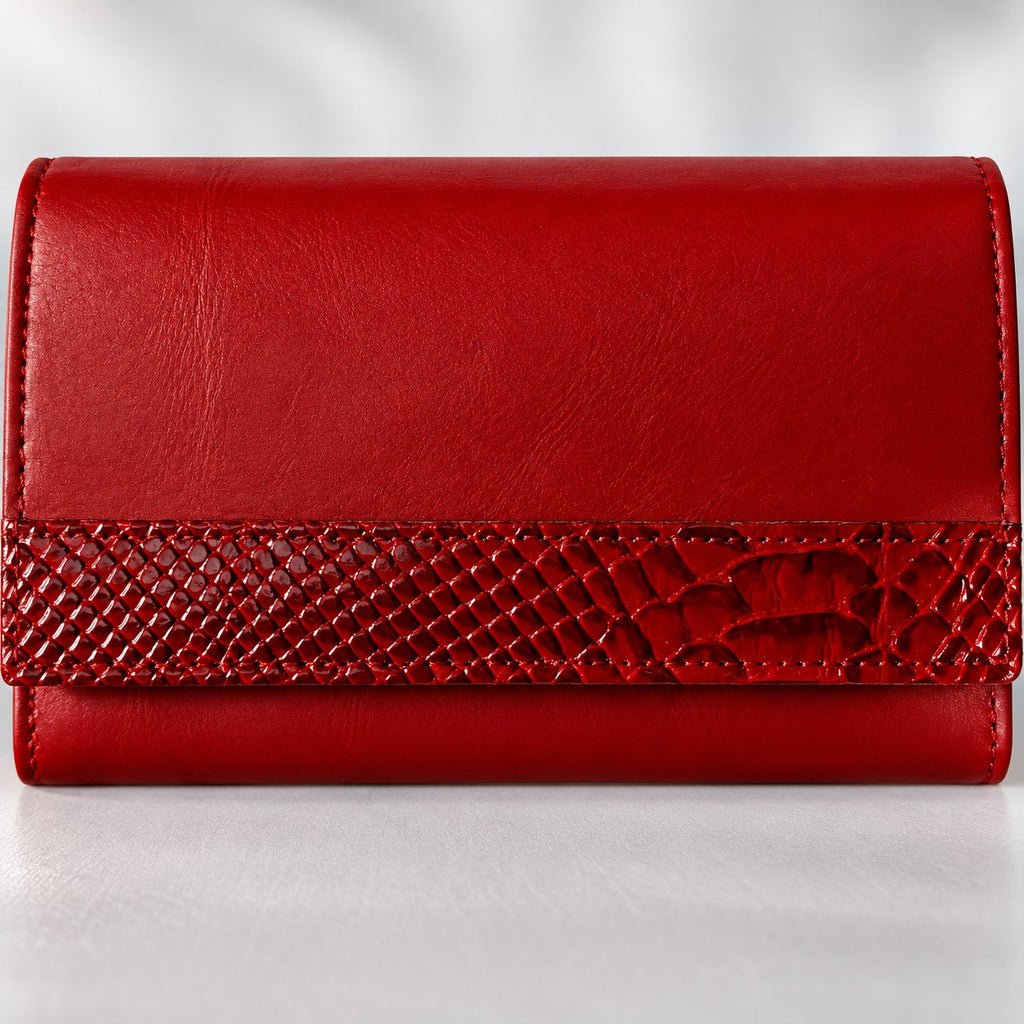 Close view of the croc grain embossed band on the red leather clutch wallet