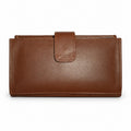 Women's brown leather long wallet with tab closure, closed front view