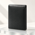 Men's slim black leather bifold wallet, closed front view