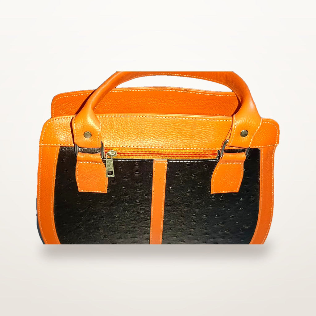 Orange and black leather handbag front view with rolled top handles
