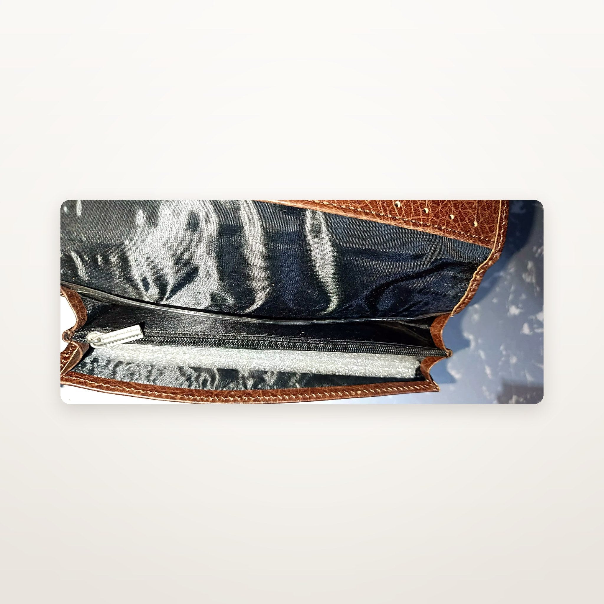 Brown leather long wallet interior with zip coin pocket