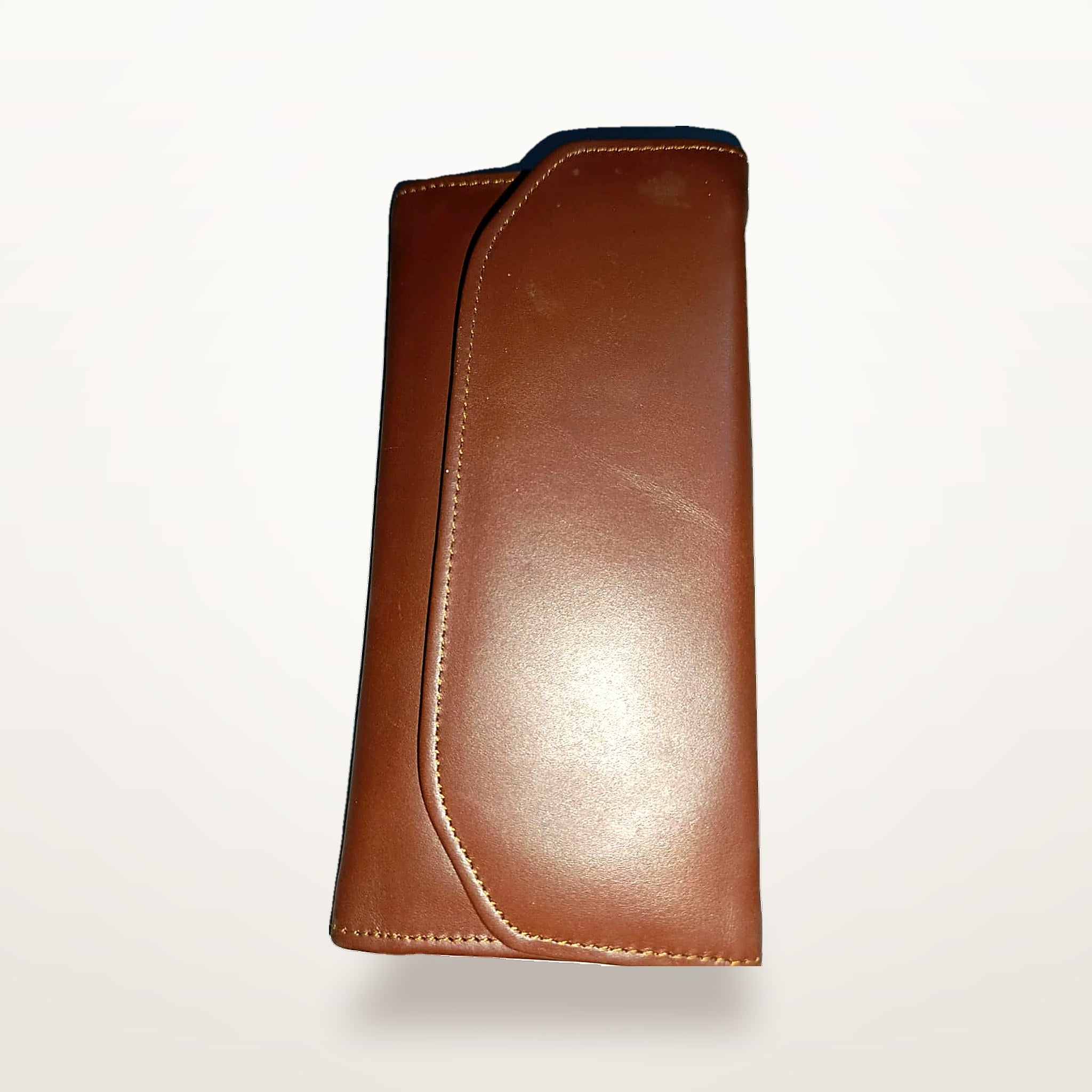 Chestnut leather envelope wallet angled, showing curved flap